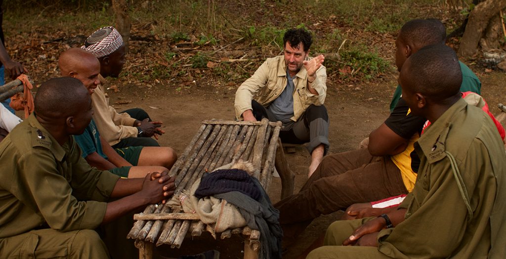 Roland Purcell, sitting with Tongwe staff